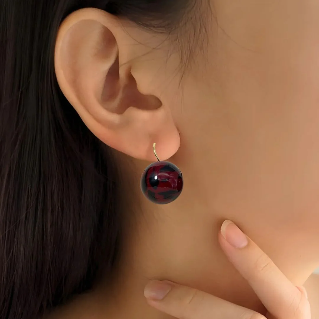 Abstract Patterned Maroon Bead Earrings - Image 2