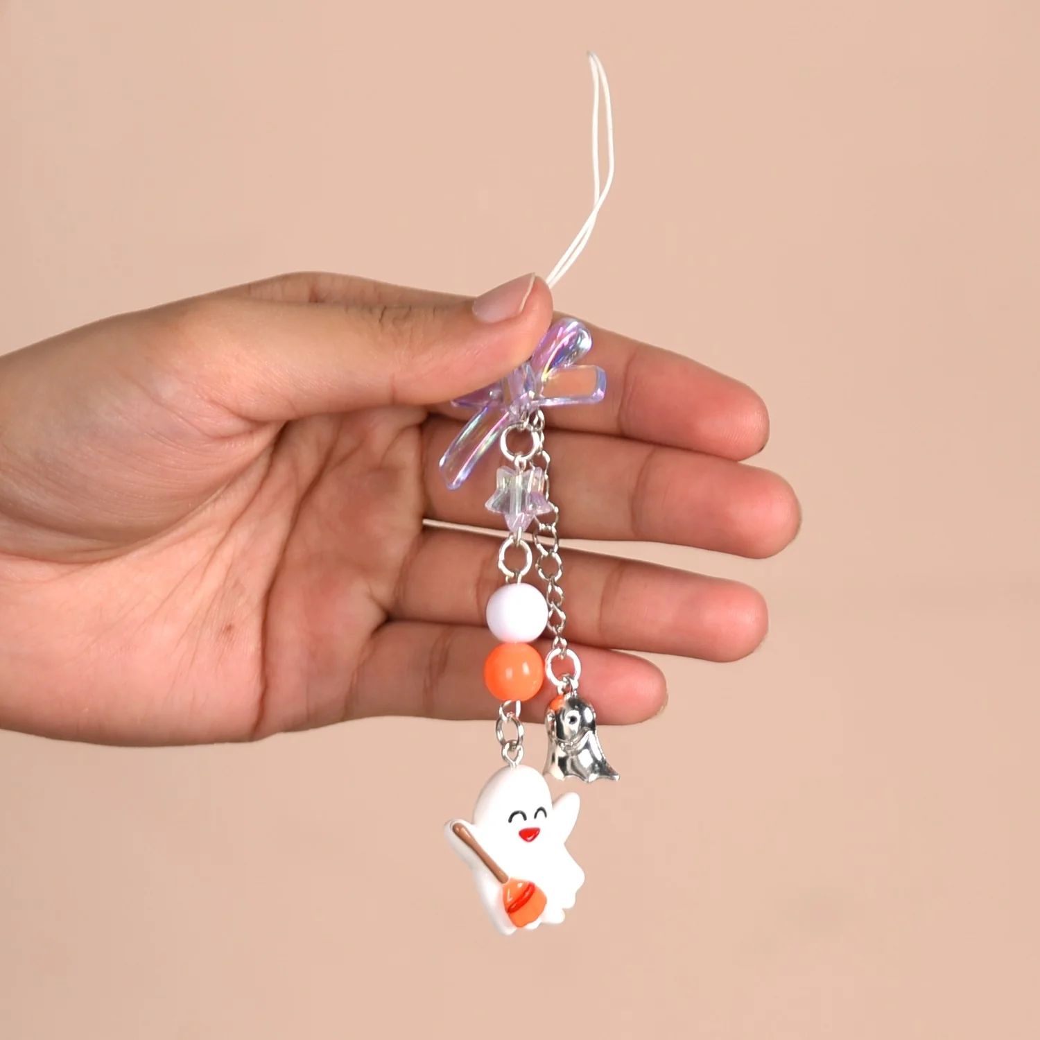 Baby Ghost On A Broom Phone Strap - Image 2