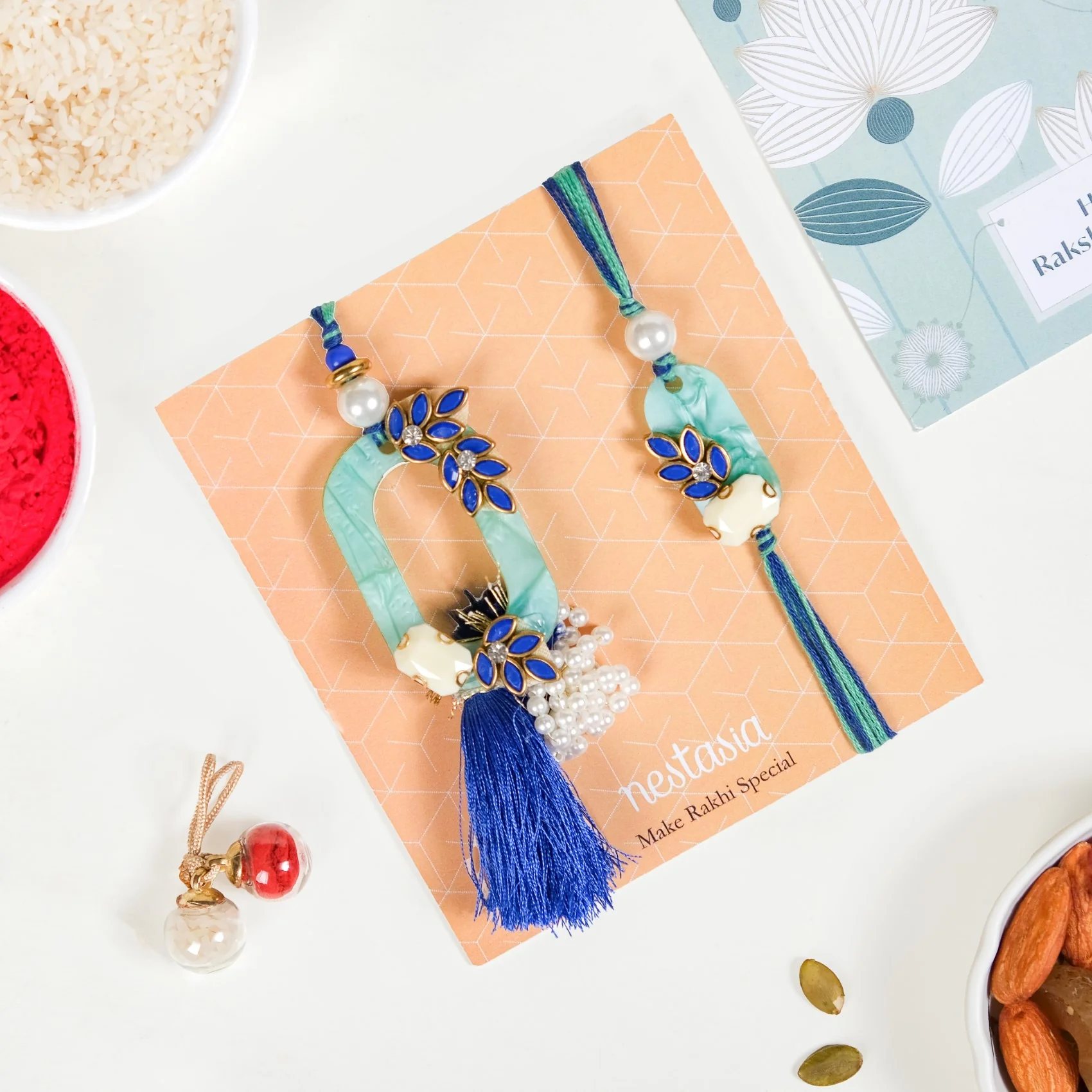 Blue Leaf Motif Designer Rakhi Lumba Set Of 4 With Box And Card - Image 3