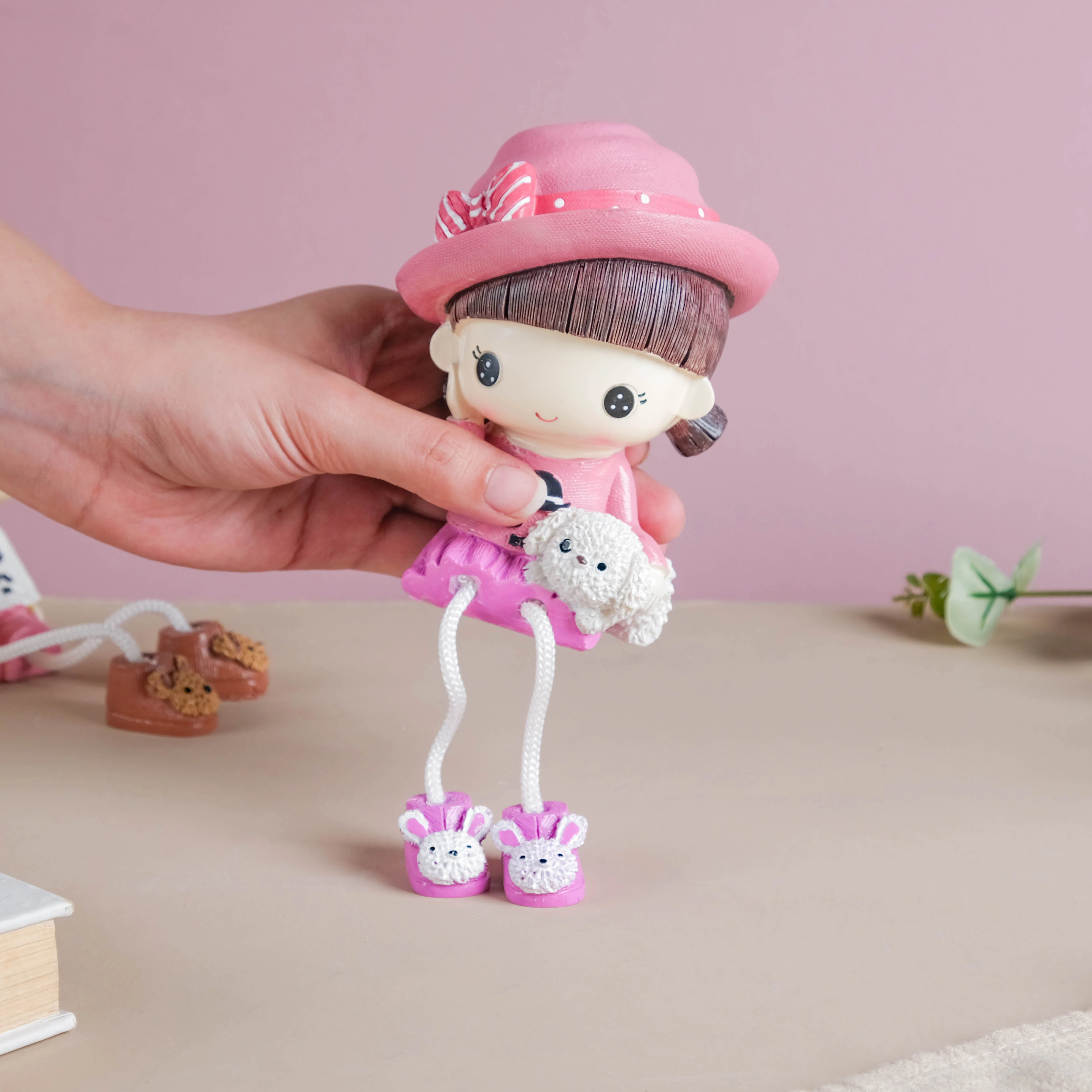 Cowgirl Resin Showpiece With Hanging Legs - Image 2