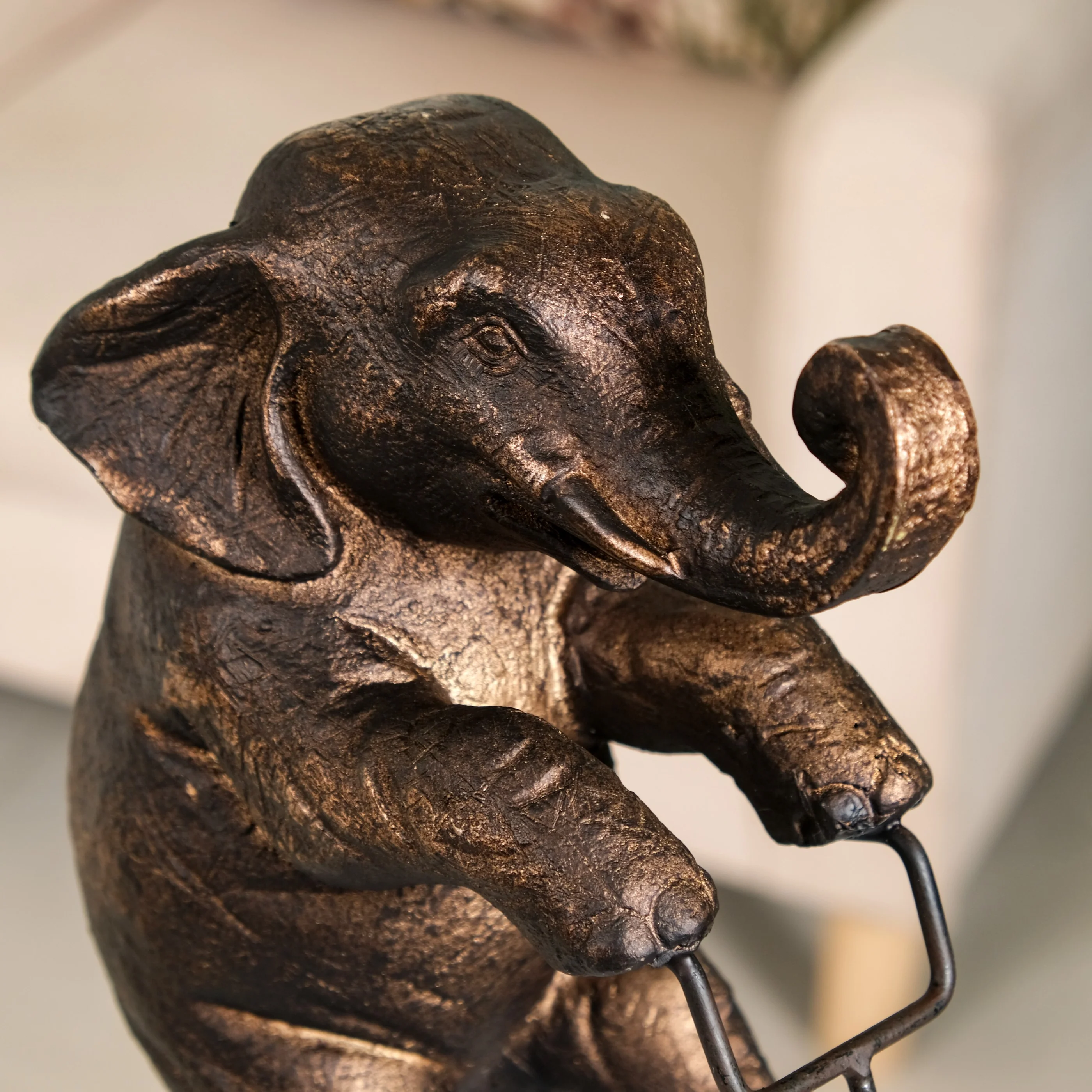 Decorative Cycling Elephant Figure - Image 3