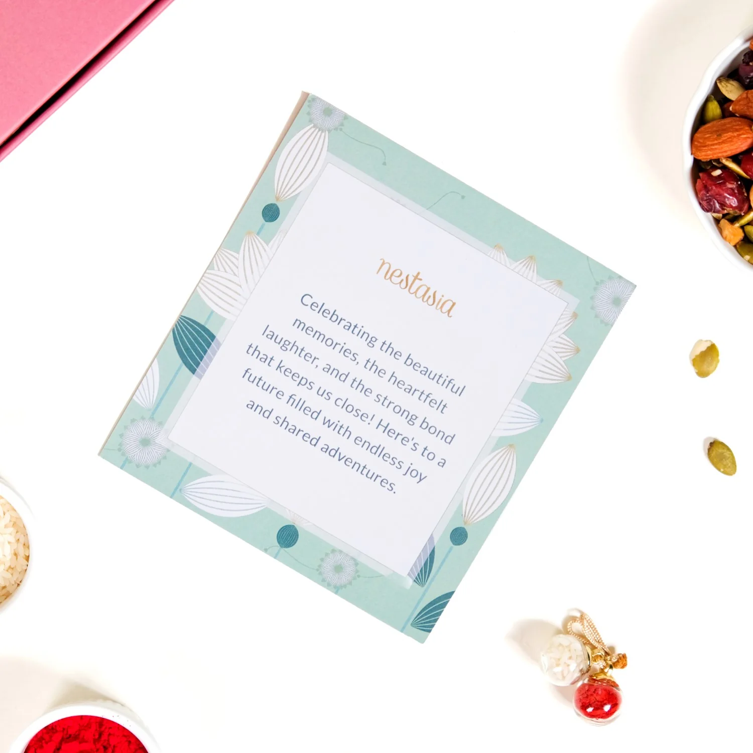 Flora Couple Rakhi Set Of 4 With Dry Fruits Gift Box Card - Image 9