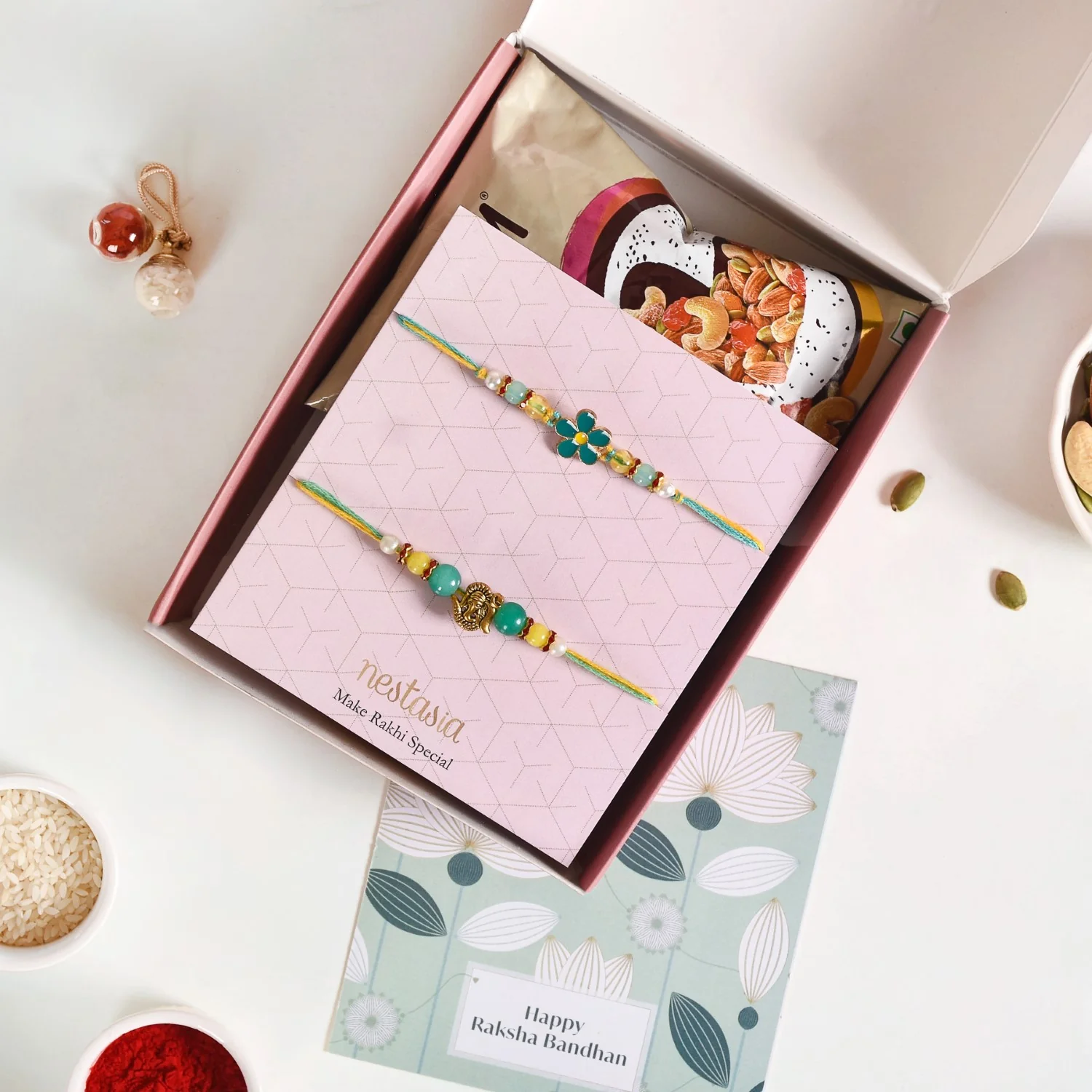 Ganesh Flower Rakhi Set Of 4 With Gift Box Dry Fruits And Card - Image 2
