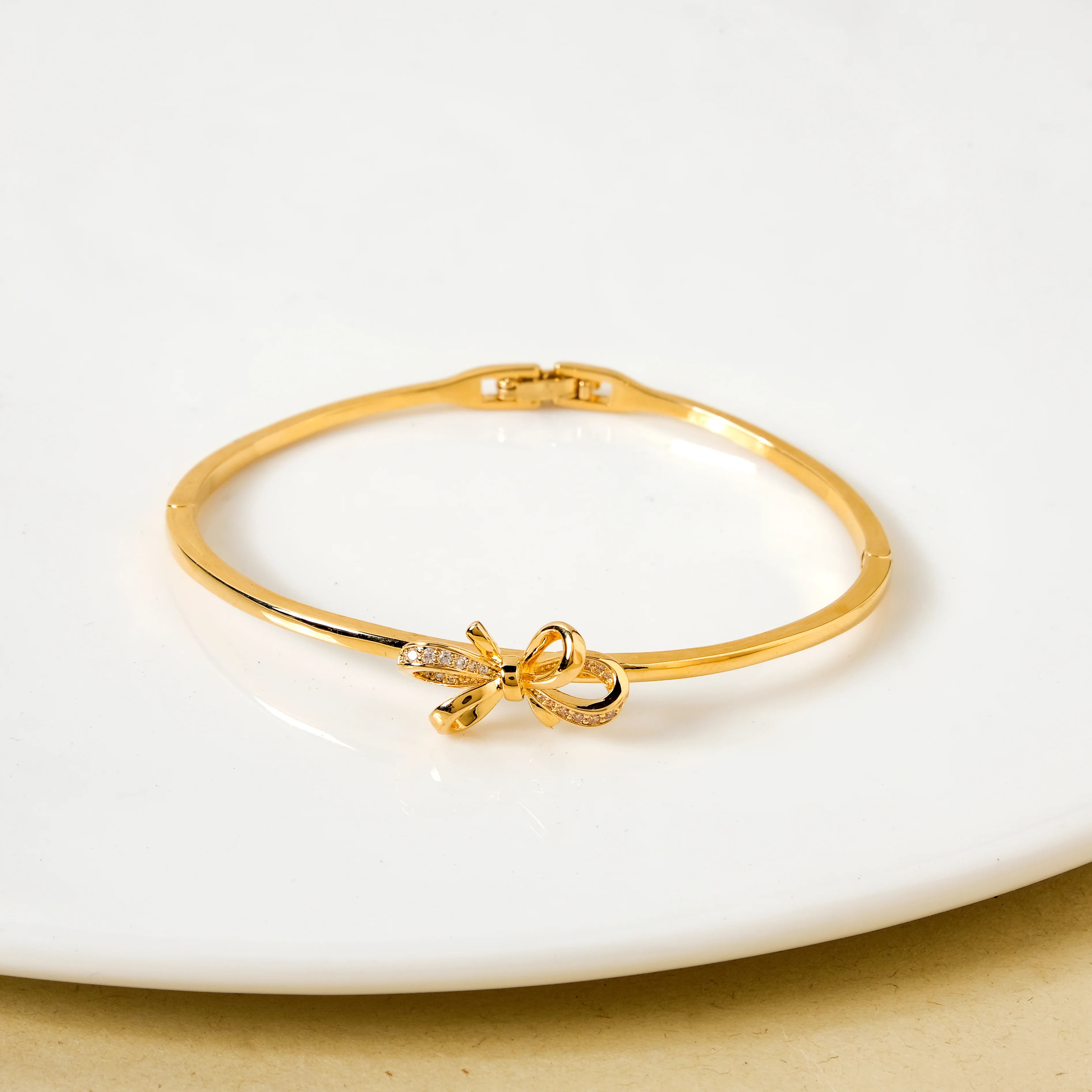 Gold Stone Studded Bow Bracelet