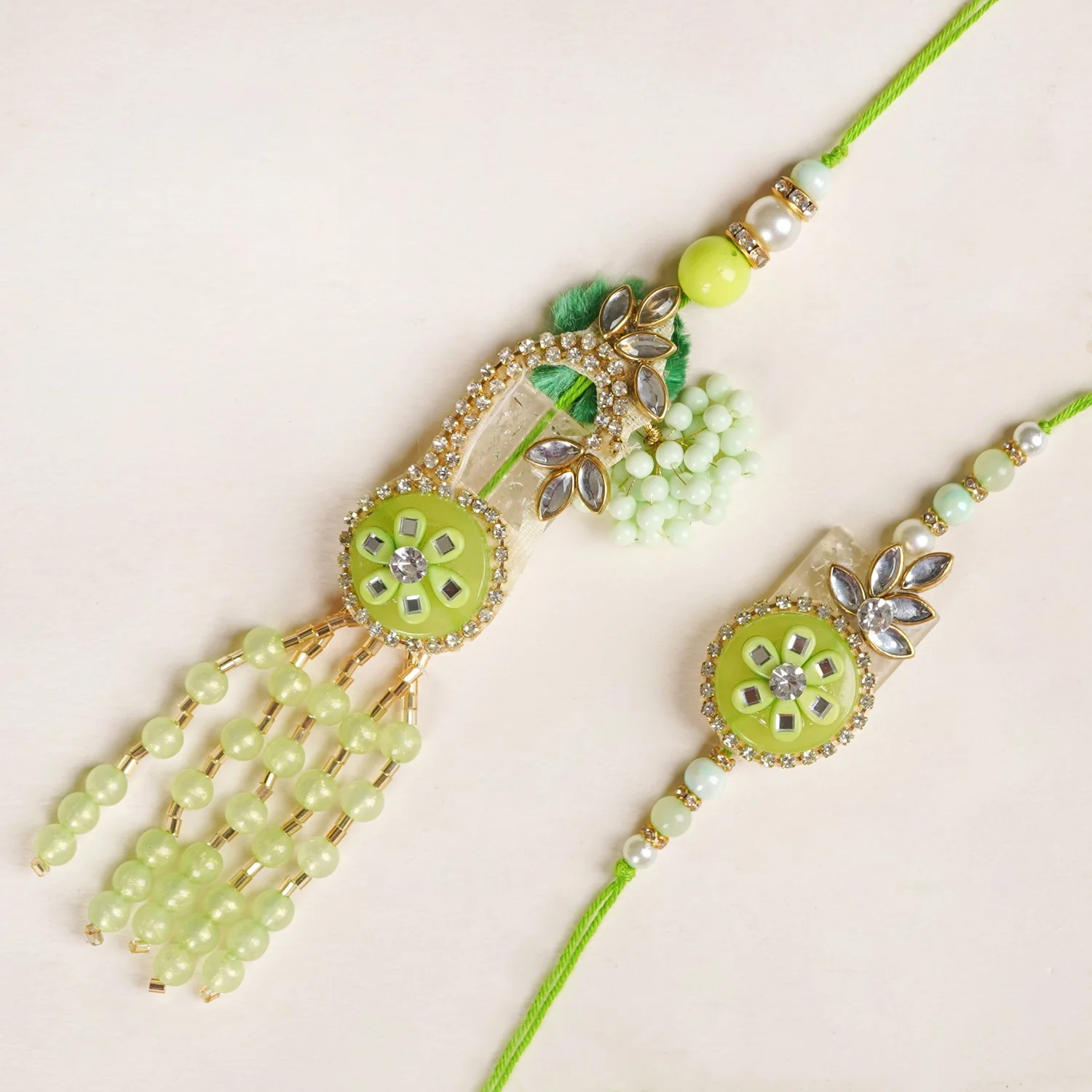 Kundan And Mirror Work Green Rakhi Lumba Set