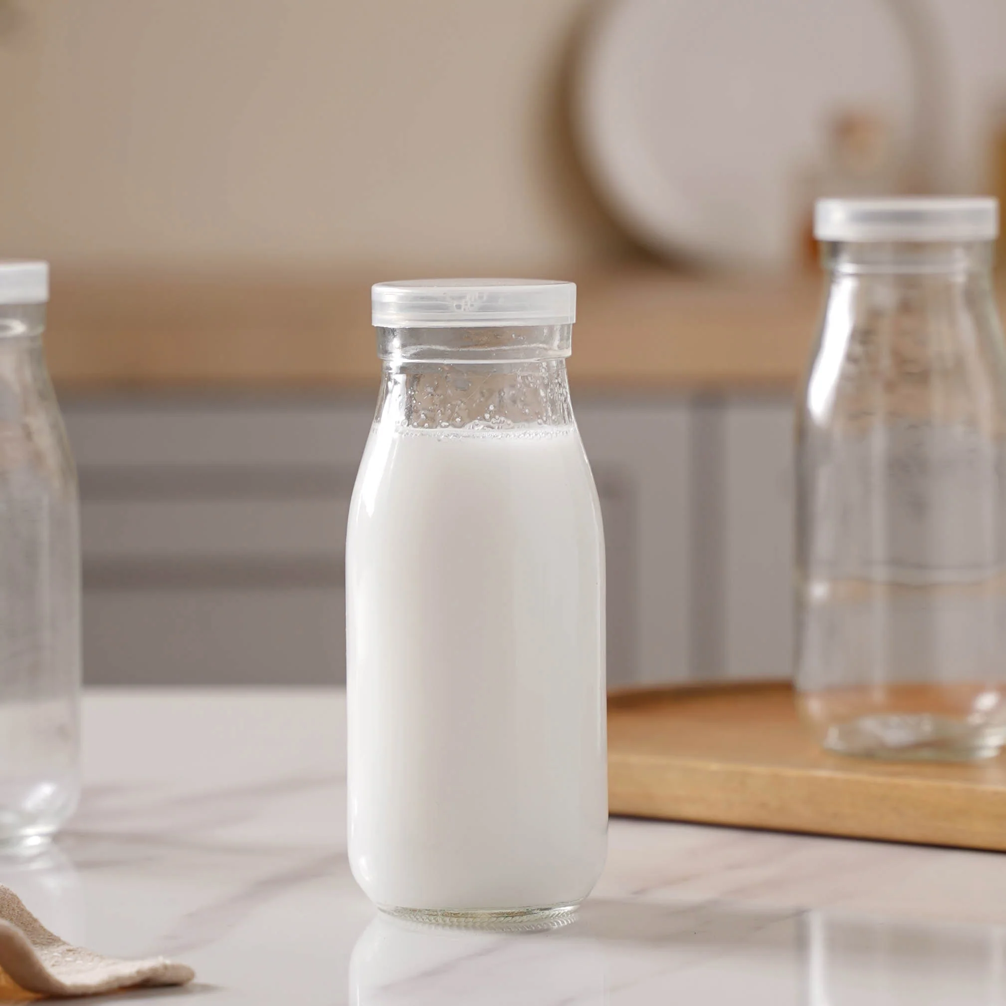 Milk Glass Bottle With Lid Set of 4 - Image 8