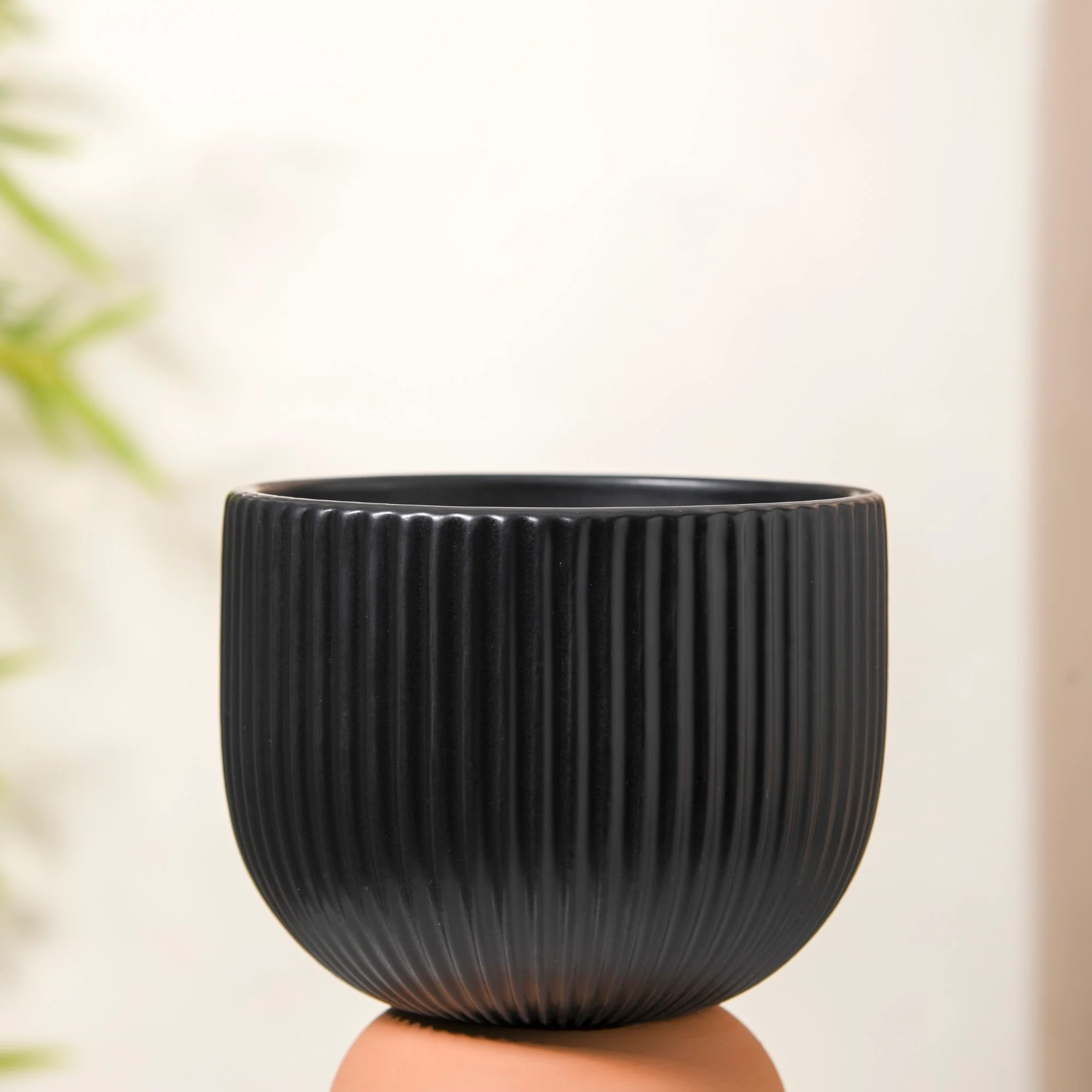 Minimalist Black Ribbed Pedestal Vase - Image 9