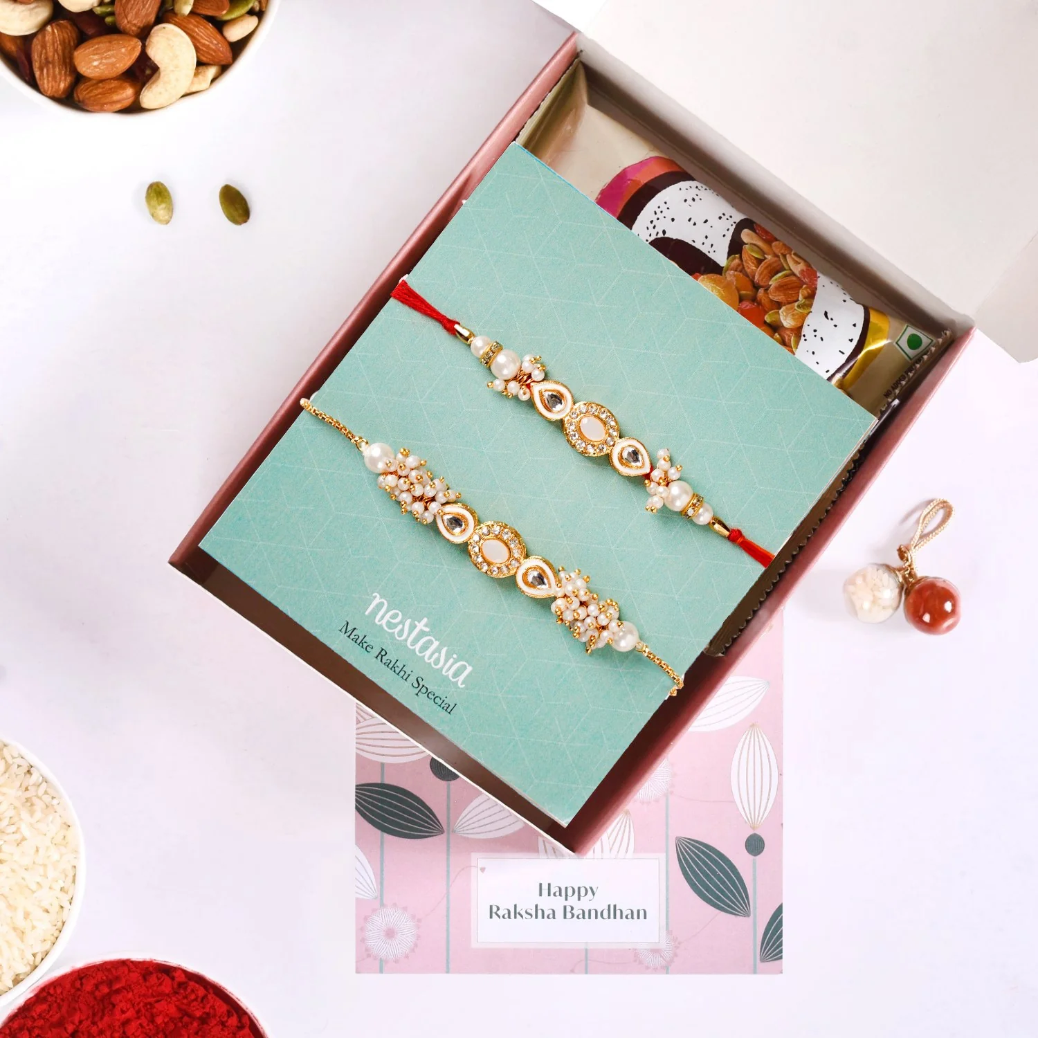 Stone And Pearl White Kundan Rakhi Set For Couple - Image 6