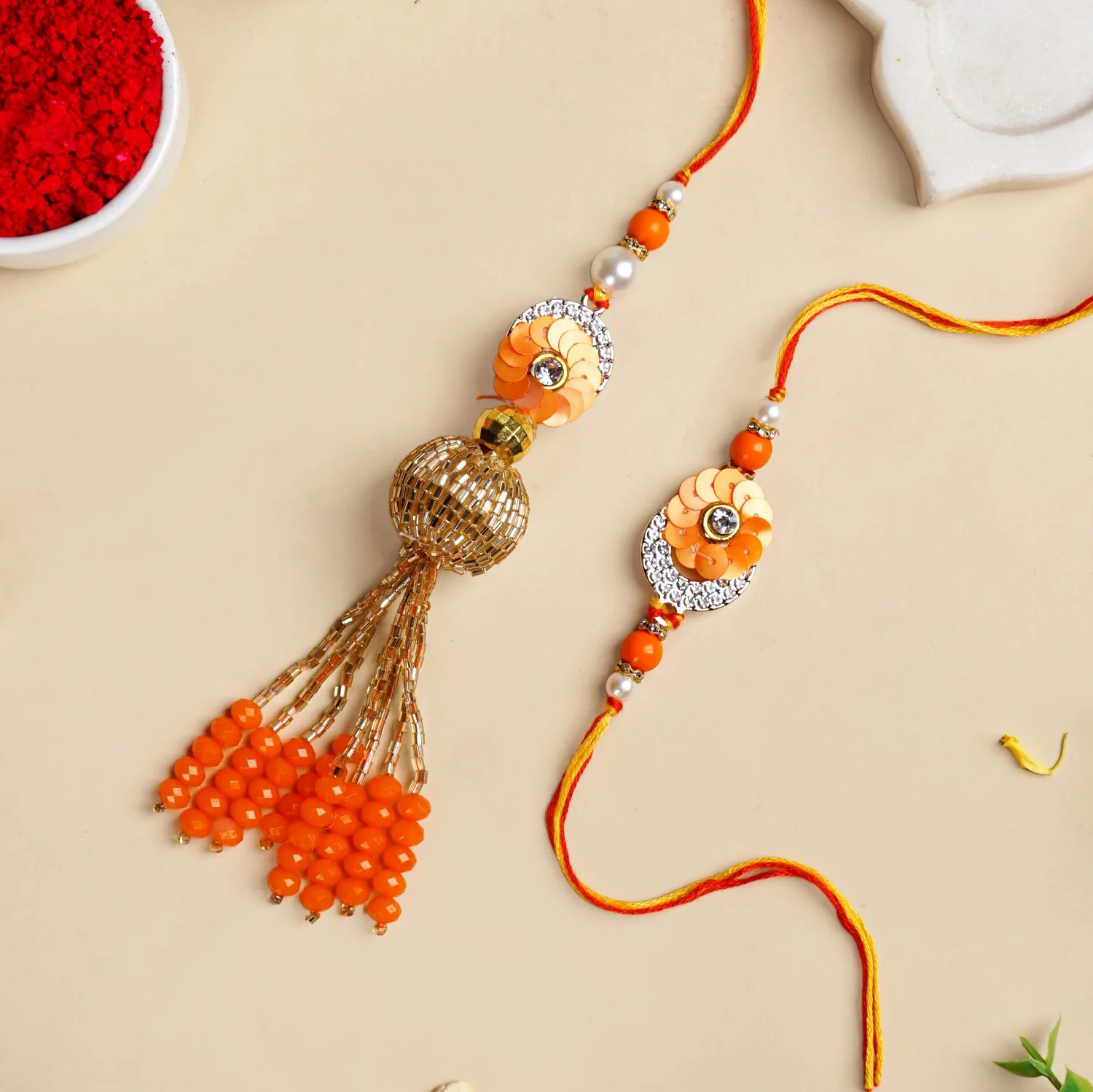 Vibrant Coloured Rakhi Lumba Set For Brother And Bhabhi